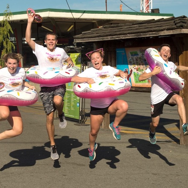 Kelsey and therapeutic recreation coursemates, jumping up and down with inflatable donuts around their waists!