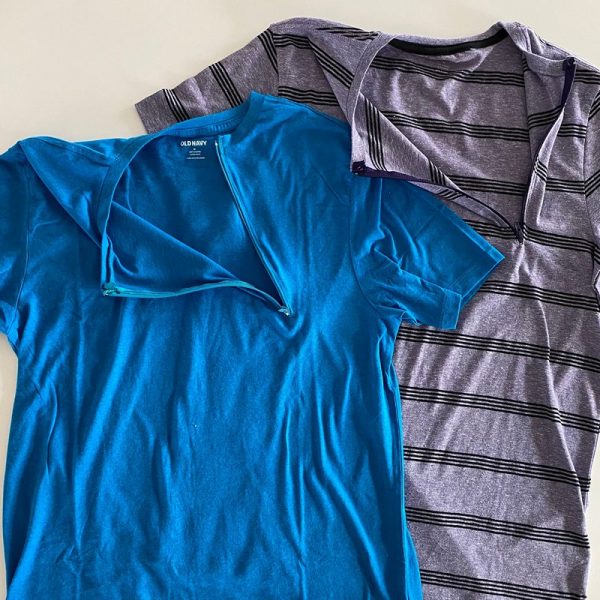 An open chemotherapy child port shirt in blue and another in grey from west coast kids cancer foundation