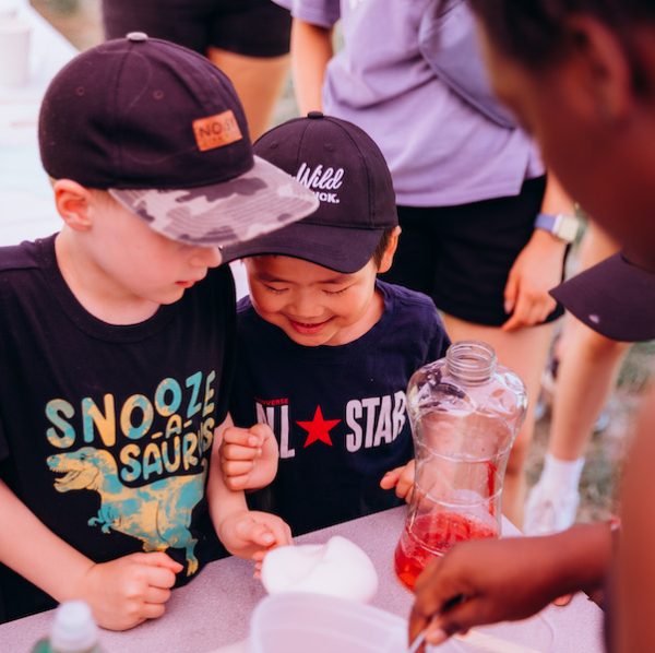 Two friends at City Camp smiling together